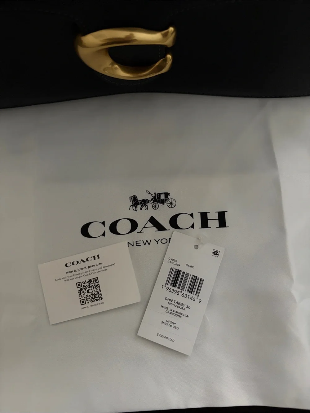 Coach sleek black